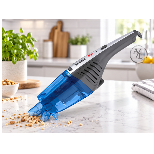 Hoover HJ72WDLB handheld vacuum cleaning sofa crumbs in a living room