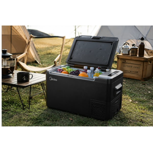 Midea 27L camping fridge freezer filled with drinks in Cyprus